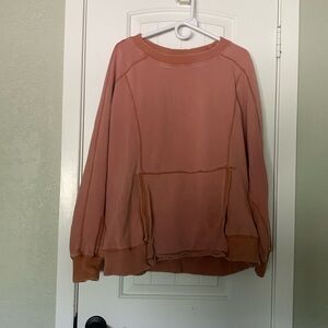 Free People burnt orange oversized sweatshirt